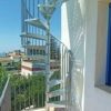 outdoor shot showing Exterior-Zink-Kit-Spiral-Staircase