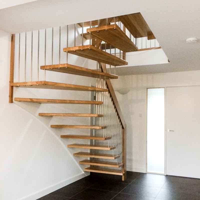 entrance hall with open wooden staircase