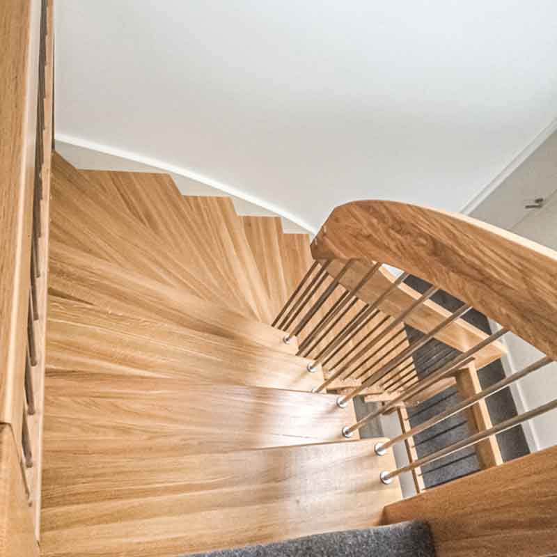 oak staircase with stainless steel spindles